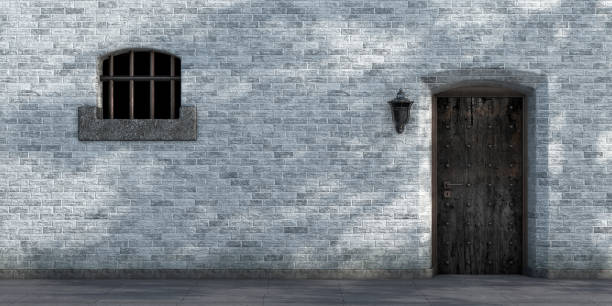 istock Prison Rusted Entrance Door and Barred Window with Brick Wall Background. 3d Rendering 2030402811