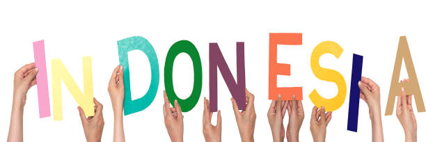 istock closeup hands people forming Indonesia text with colorful letters 2030405069