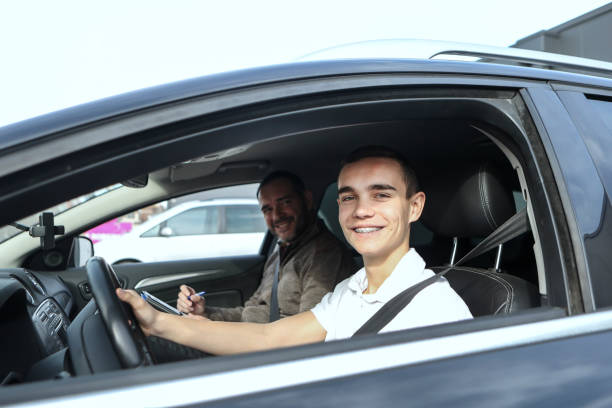istock Teenager learning how to drive a car 2030411515