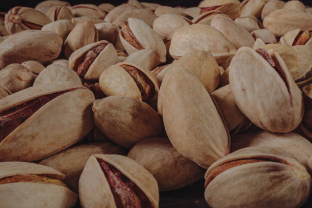 istock Pistachio nuts close-up. Background of pistachios. 2030429968