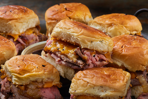 Copycat Hawaiian Roll Roast Beef and Cheddar Sliders with Fried Onions and au Jus