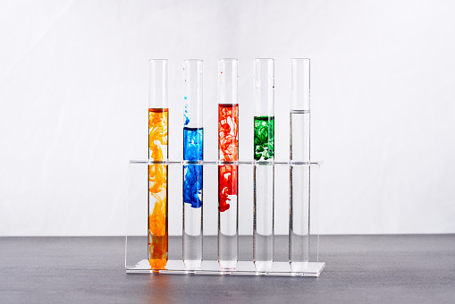 Laboratory glass tube with colored liquid.