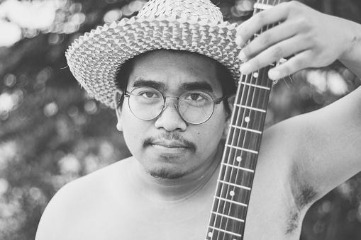 male southeast asian musician