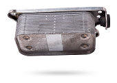 Gearbox heat exchanger - radiator, with metal chrome elements and tubes - detail of a car mechanism on a white isolated background. Replacing the automobile parts. Spare parts catalog.