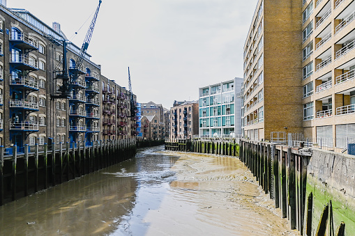 London, UK, 3 September 2023: St Saviours Dock in London from a footbridge