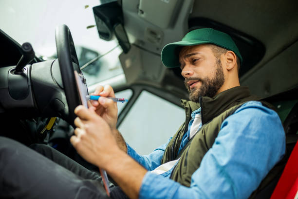 istock Truck driver feeling tired during the ride. 2030554318