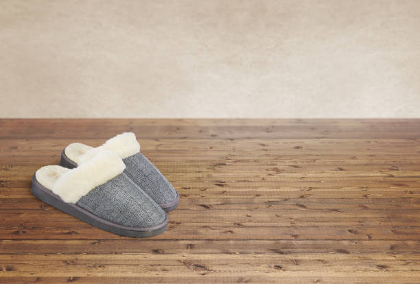 Women's house slippers are in the hallway of the apartment, home comfort