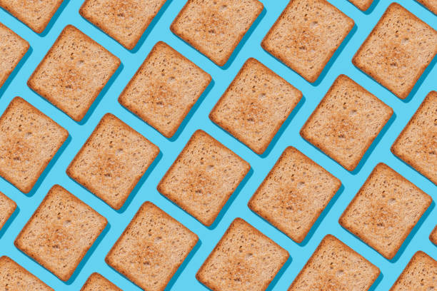 istock Toast pattern on blue background. Creative food concept, morning breakfast brunch concept. Modern minimal food photography collage 2030575169