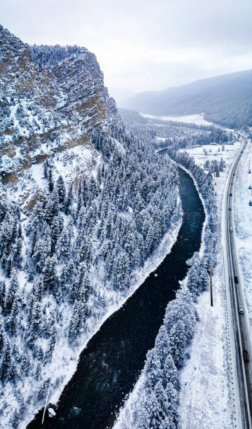 istock Snow covered mountains canyon through the river road 2030594039