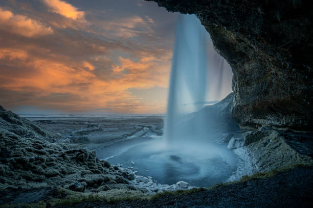 istock natural waterfal and sunset 2030594969
