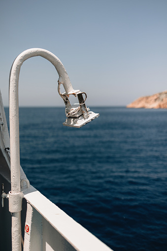 Lamp on the deck of a ship overlooking  the Aegean Sea