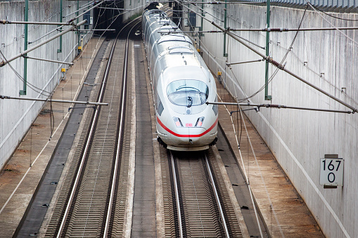 Kelsterbach, Germany - February 20, 2024: German highspeed train (ICE) on the Frankfurt–Cologne high-speed rail line. ICE, formerly known as InterCityExpress is a highspeed train system in Germany.