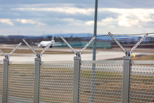 Fence and razor wire at airports runway