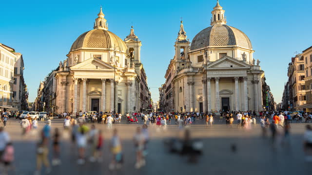 Time lapse of Crowd of People tourist walking and sightseeing attraction twin churches at Piazza del Popolo a large urban square landmark and gateway with marble columns in summer in Rome, Italy