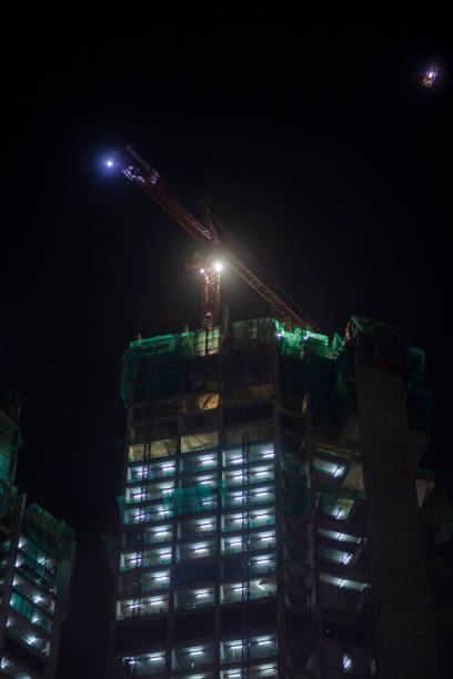 the building is still under construction in Jakarta at night