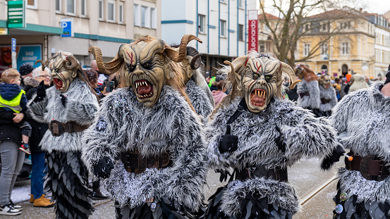 Basel, Switzerland - February 28th 2023. Close-up of a parade group in costumes