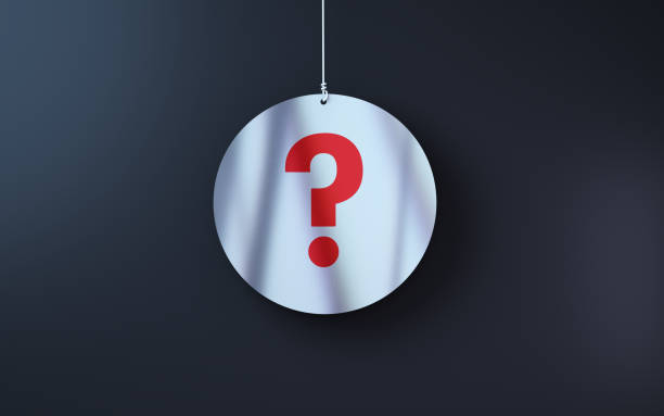 istock Red Question Mark Sign on white note paper hanging on string on black background Black background 2030668629