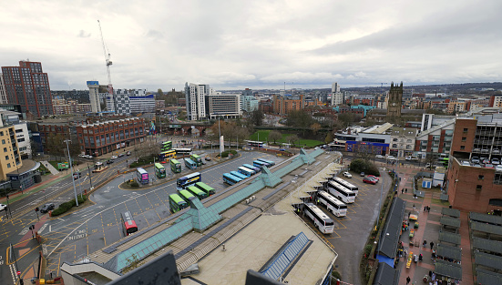Leeds, UK 02 22 2024 - Leeds bus and coach station seen from above, with buses and coaches taking people in and out of the city