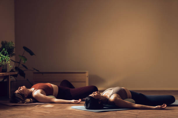 istock Two Women Practicing Yoga Together in a Peaceful Indoor Setting 2030734673