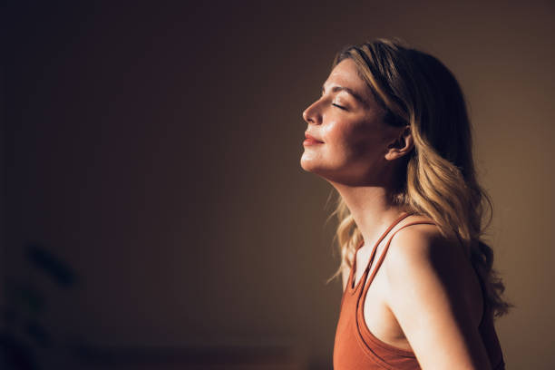 Serene Woman in Contemplative State Enjoying Peaceful Moment