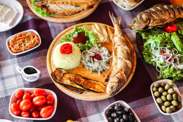 istock Table Set With Plates of Delicious Food 2030739993