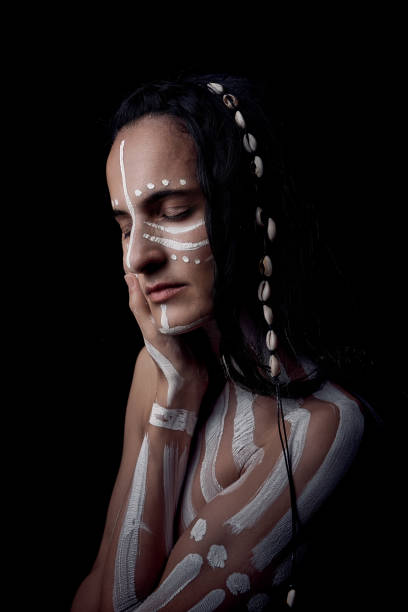 istock Young woman with painted body in studio 2030767477