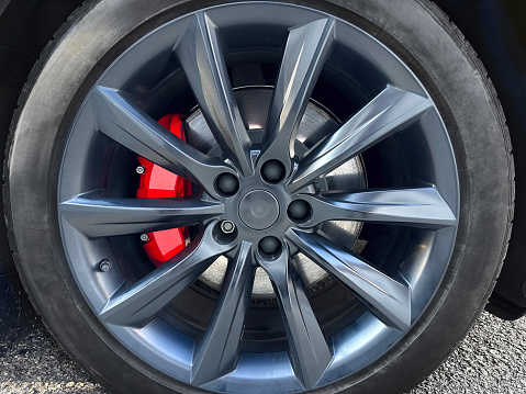 Sports car wheel detail with brake pads