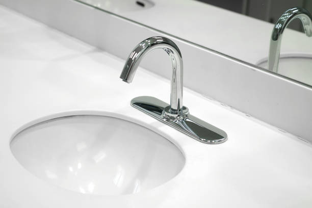 istock close up on stainless sink in bathroom 2030792769