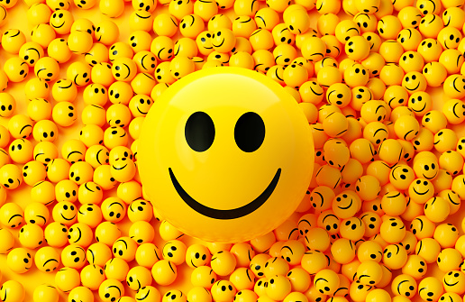 3d rendering of emoji with happy face. large group of objects.