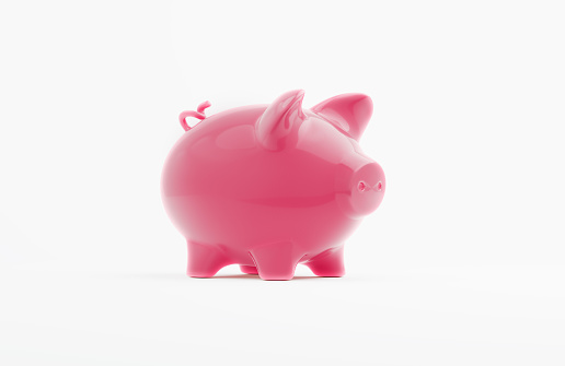 Pink piggy bank on white. Horizontal composition.