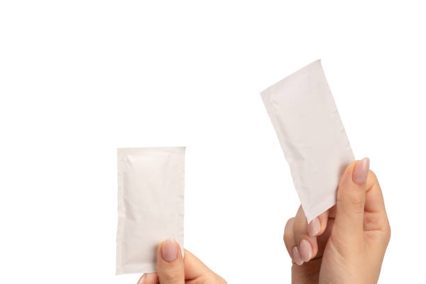 istock Wet wipe in a woman hand isolated on a white background. 2030858006
