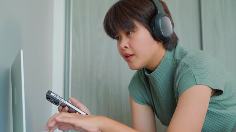 Asian woman working from home