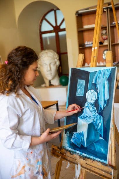 istock Fine art students painting 2030868042