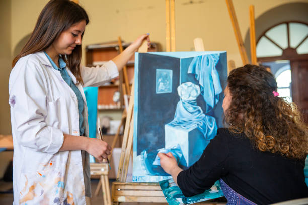 istock Fine art students painting 2030868044