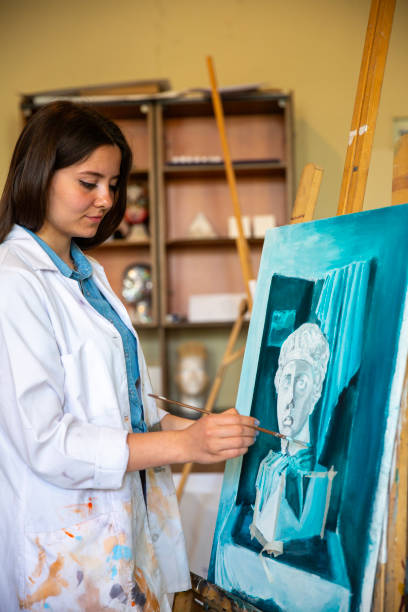 istock Fine art students painting 2030870142