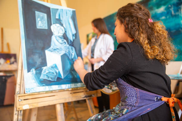istock Fine art students painting 2030871211