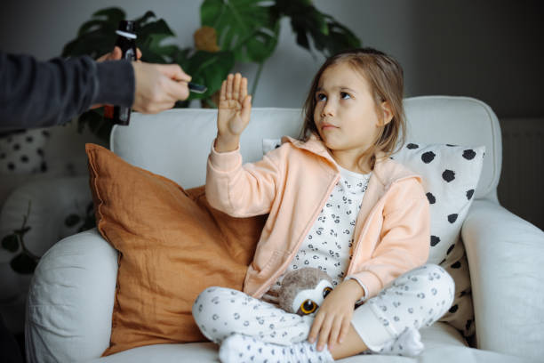istock Little child refuses to take medication 2030871718