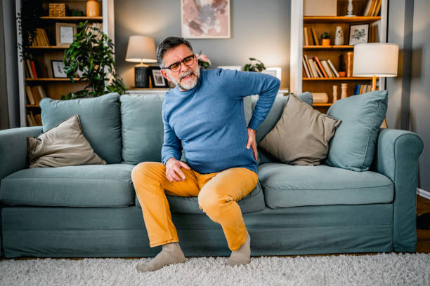 istock Mature man suffering from back pain 2030871720