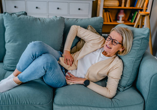 istock Woman suffering from abdominal pain 2030875445