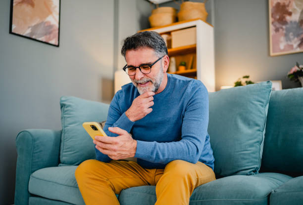 istock Mature man relaxing at home 2030877581