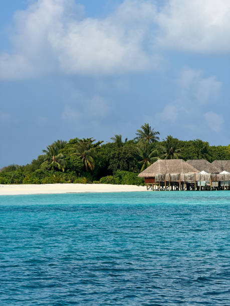 istock maldives Island Resort with bungalows and beach lagoon 2030879249