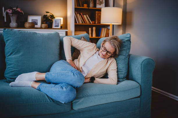 istock Woman suffering from stomach pain 2030882948
