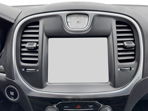 Luxury car dashboard detail with a blank touch screen