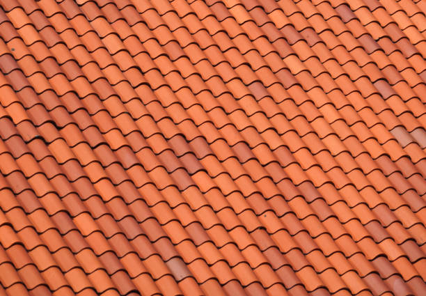 close up on red shingle on the roof