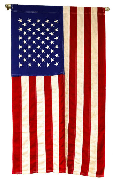istock close up on old USA national flag isolated on white 2031026080