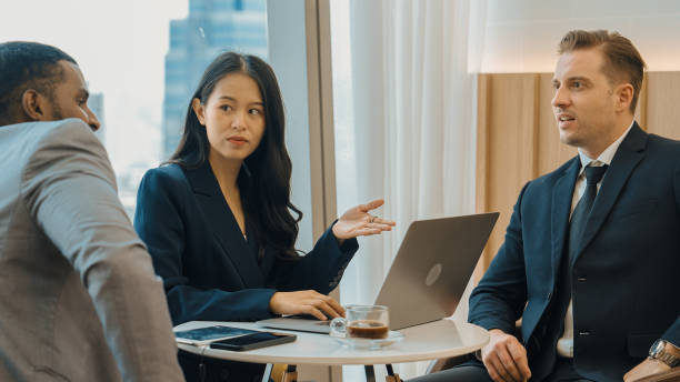 istock Diversity business people in ornamented office discussing business plan 2031066468
