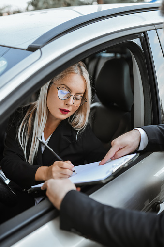 Beautiful Businesswoman Renting A Car For Her Needs