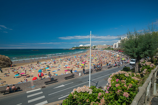 Biarritz, France - July 28 2016: Looking down at La Grande Plage beach in Biarritz.