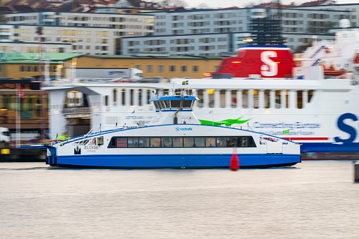 Gothenburg, Sweden - november 12 2023: Hubrid electric passenger ferry Eloise crossing the river.