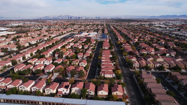 Aerial View, Las Vegas Suburbs, Summerlin Residential Neighborhood and Community Buildings, Revealing Drone Shot